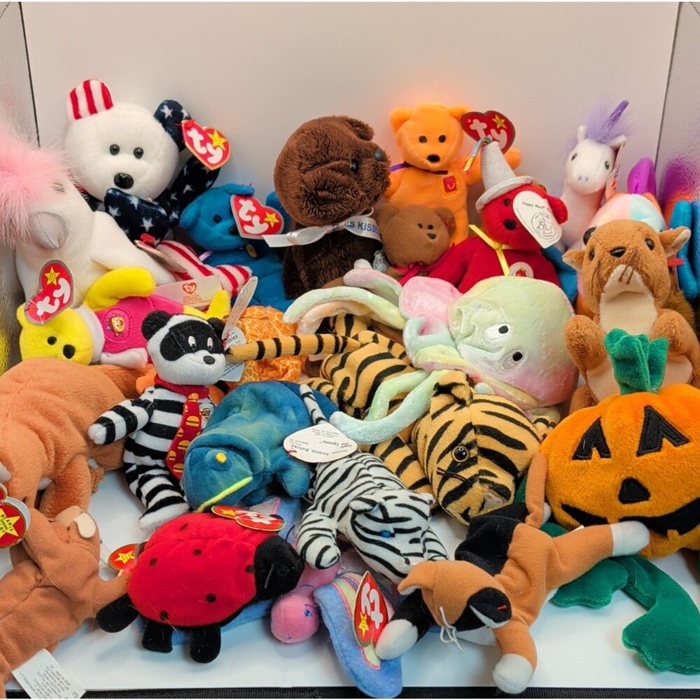 Assortment of Ty Beanie Babies.  Some are missing tags.  Some tags are damaged.